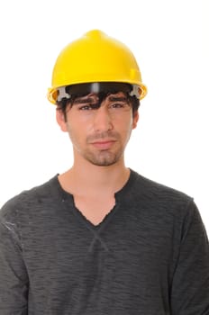Young construction worker wearing a yellow hard hat isolated over white