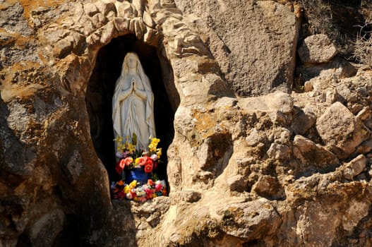 Statue of Mary at Spanish mission San Xavier del Bac started in 1692 by Spanish missionaries in the Americas