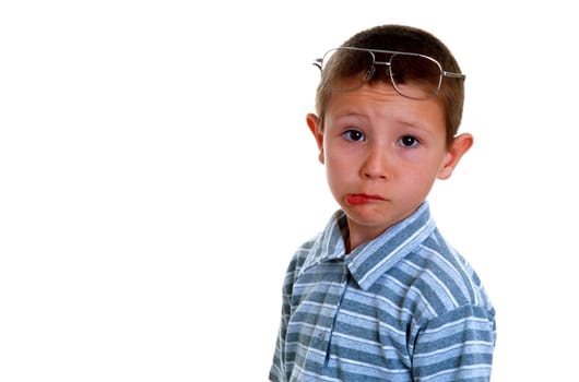Portrait of a young boy wearing glasses
