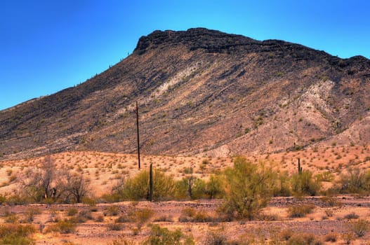 Arizona desert mountain with power lines