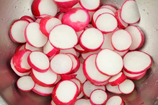 Cut into chips, this red and white root vegetable has much flavor.