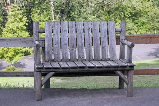 Old rustic looking seating outside in nature.