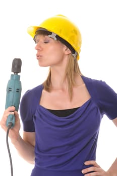 Blond girl holding an electric drill wearing a hard hat