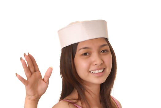 lovely young Asian girl wearing a sailor&#039 s hat