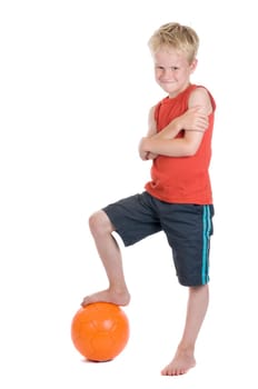 Boy with a football, against a white background.