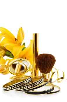 Celebrating a special day with luxury makeup and jewelry. Isolated on white.