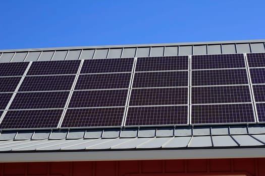 Natural energy from the sun is gathered with an outdoor technology system on a roof.