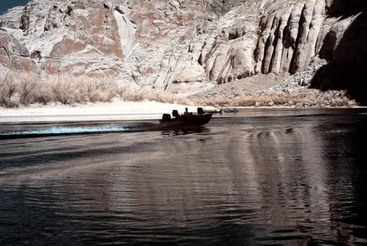 Boaters on The Colorado River in Glen Canyon Arizona