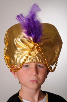 Young boy wearing a Sultan or Shiek&#039 s halloween costume