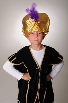 Young boy wearing a Sultan or Shiek&#039 s halloween costume