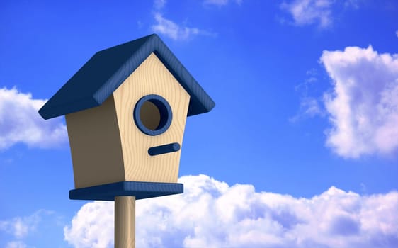 Blue birdhouse in summer