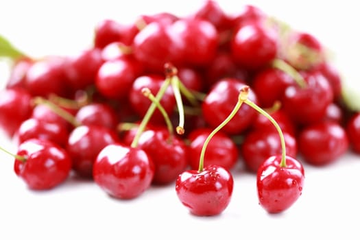 Fresh cherries on white background
