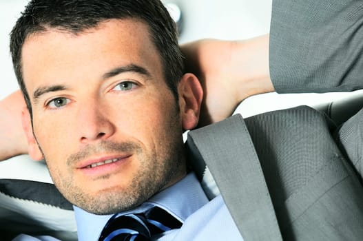 Attractive businessman is taking break from business