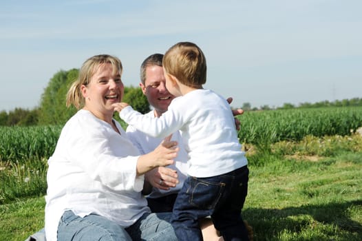 Happy young family with toddler