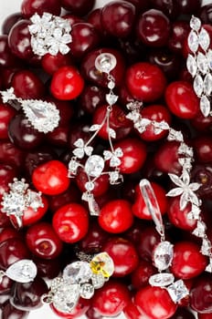 Jewels at fruit red ripe cherries berry background