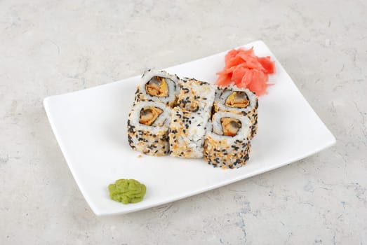 Closeup of Sushi rolls at plate with sesame