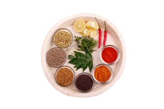 Indian kitchen spices and herbs on a plate