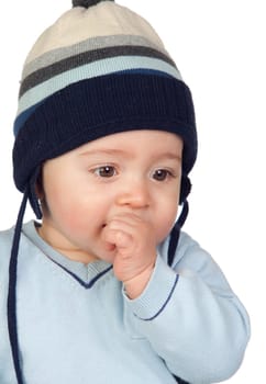 Beautiful baby with wool cap isolated on white background