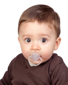 Beautiful baby with a pacifier isolated on white background