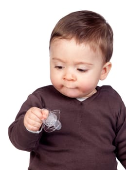Beautiful baby with a pacifier isolated on white background