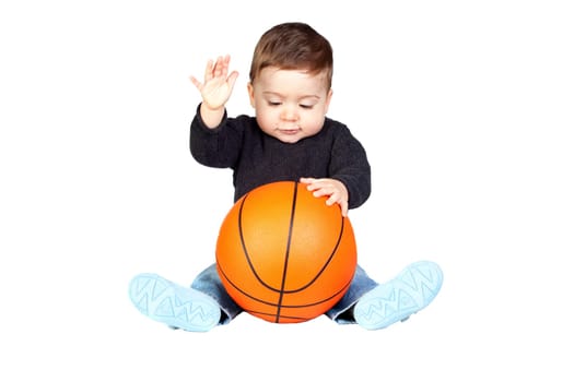 Beautiful baby with a basketball isolated on white background