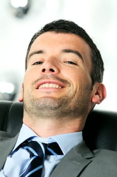 Attractive businessman is taking break from business
