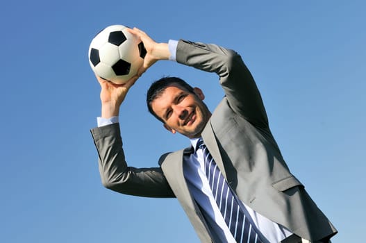 Business man coaching soccer