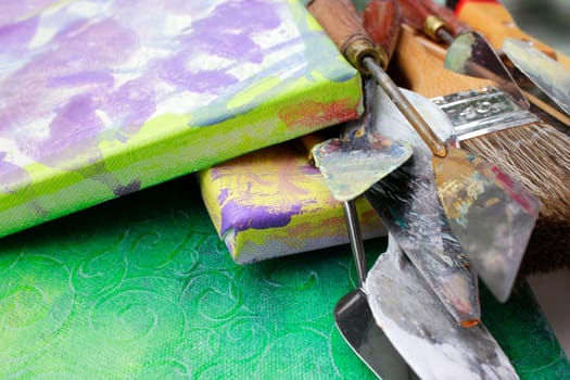 Painted stretchers,spatulas and brushes