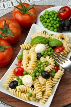 Pasta salad with mozzarella and basil