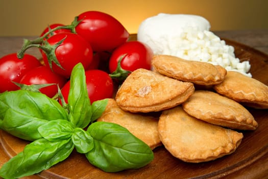 classic italian panzerotti with tomatoes and mozzarella