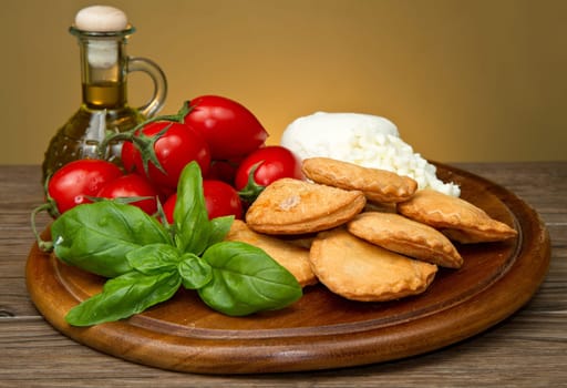 classic italian panzerotti with tomatoes and mozzarella