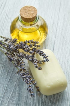 lanvander soap with flower on wooden background
