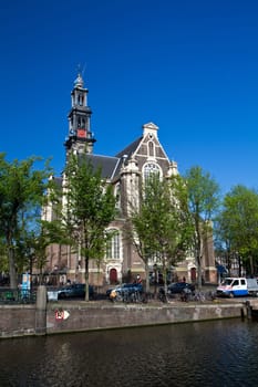 a photo of famous westerkerk in amsterdam