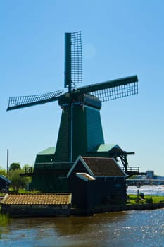 Photo of windmill in Holland with blue sky