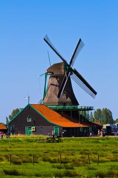 Photo of windmill in Holland with blue sky