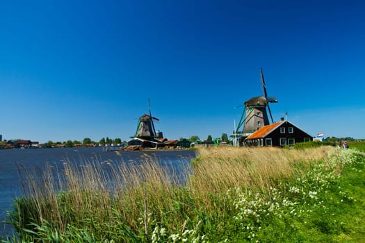 Photo of windmill in Holland with blue sky
