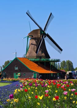 Photo of windmill in Holland with blue sky