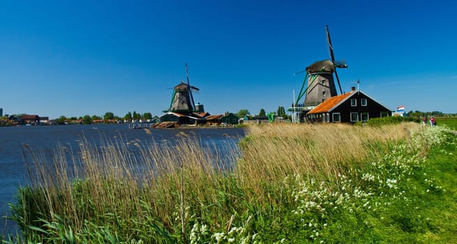 Photo of windmill in Holland with blue sky