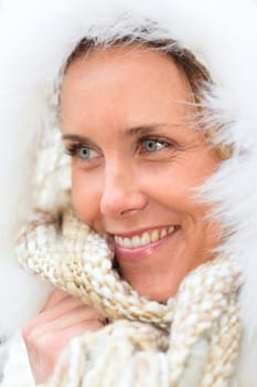 portrait of beautiful woman with blue eyes in autumn