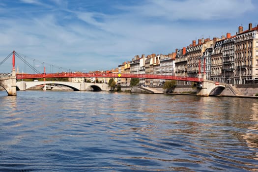Lyon city with red footbridge in summer