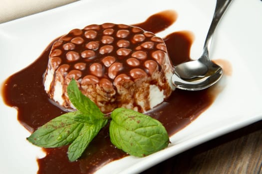 italian panna cotta dessert with chocolate topping