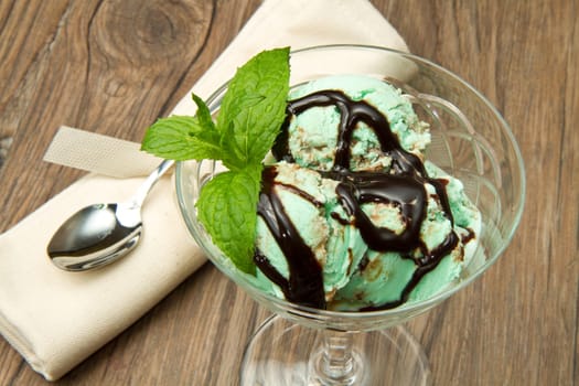 Mint ice cream with chocolate sauce