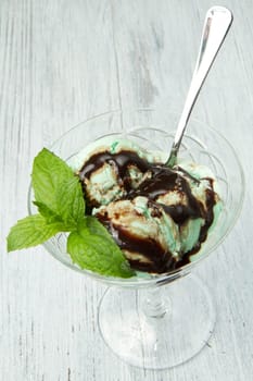 Mint ice cream with chocolate sauce