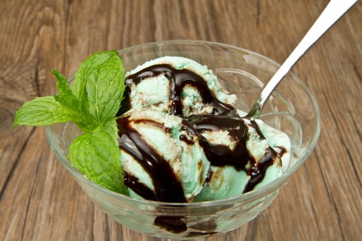 Mint ice cream with chocolate sauce