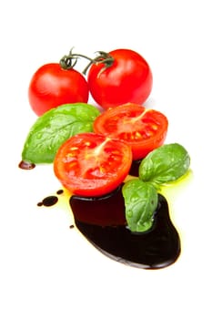 Fresh tomato and basil over olive oil and balsamic vinegar