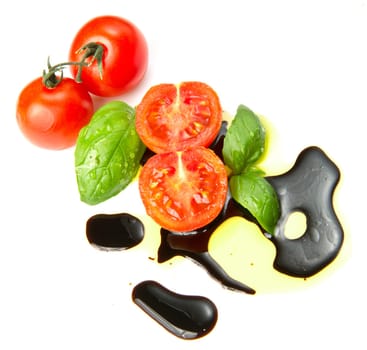 Fresh tomato and basil over olive oil and balsamic vinegar