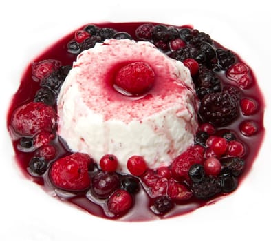 italian panna cotta dessert with fresh berries