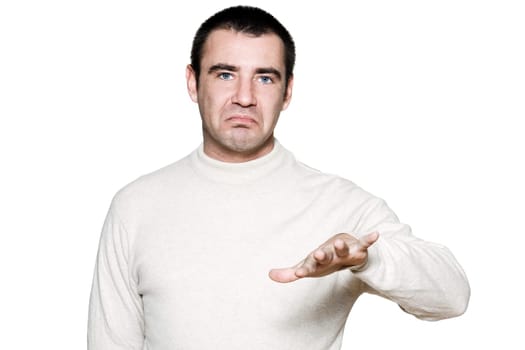 Portrait of a handsome expressive man showing 50-50 sign in studio on white isolated background