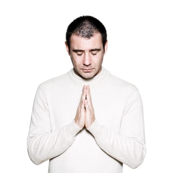 Portrait of a handsome expressive religious man in studio on white isolated background