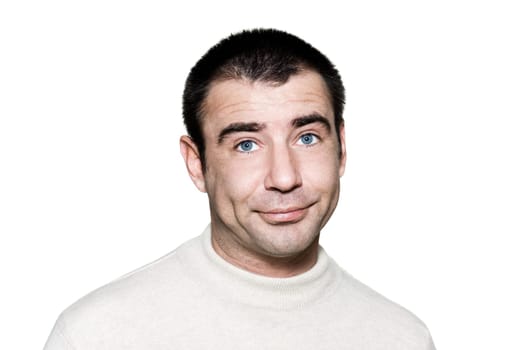 Portrait of a handsome expressive bored man in studio on white isolated background